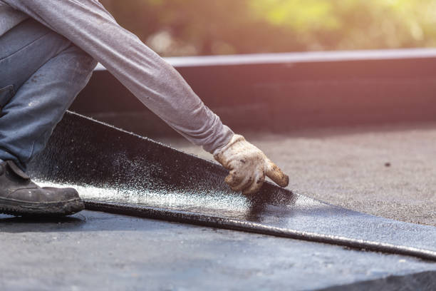 Professional Basement Waterproofing technician working in Mountainair, NM